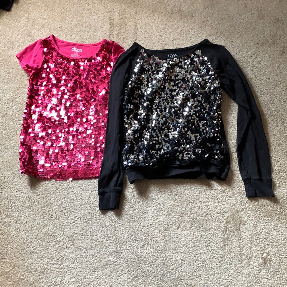 Two sparkle shirts